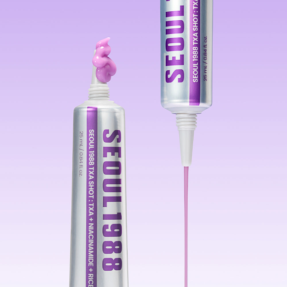 Two SEOUL 1988 TXA Shot tubes dispensing purple gel-cream texture